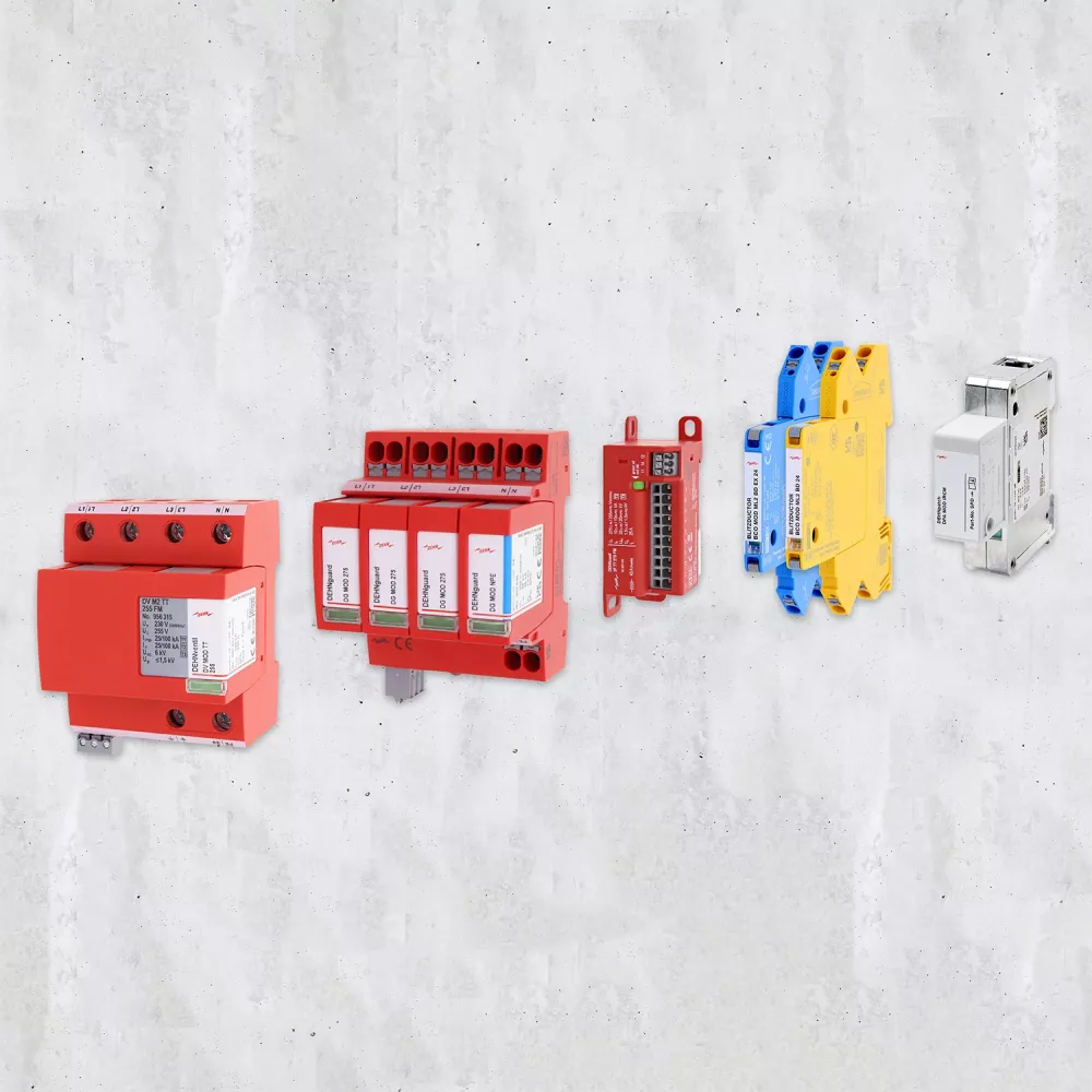 Surge protection products from DEHN on a concrete background