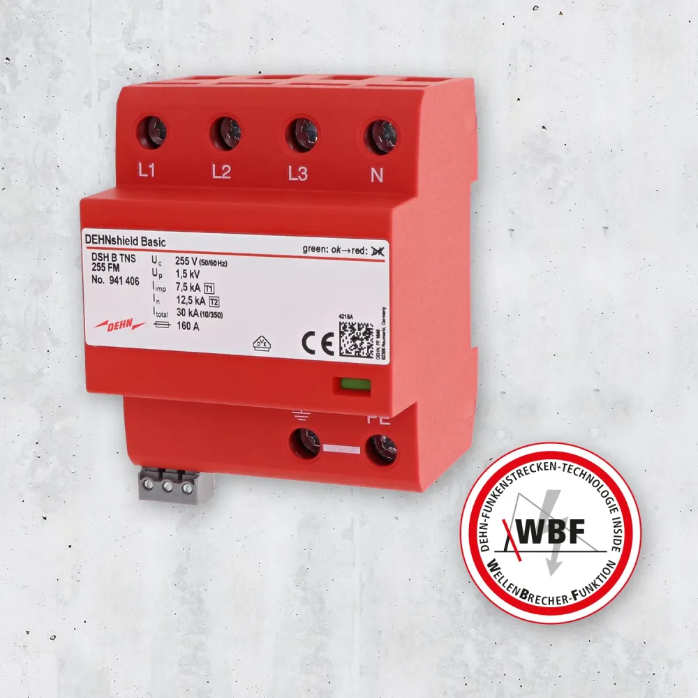 Red DEHNshield Basic surge protection device labeled L1, L2, L3, N mounted on wall, WBF logo visible.